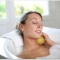 Beautiful woman relaxing in baththub